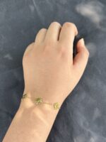 Dainty Gold Flower Bracelet - Image 4