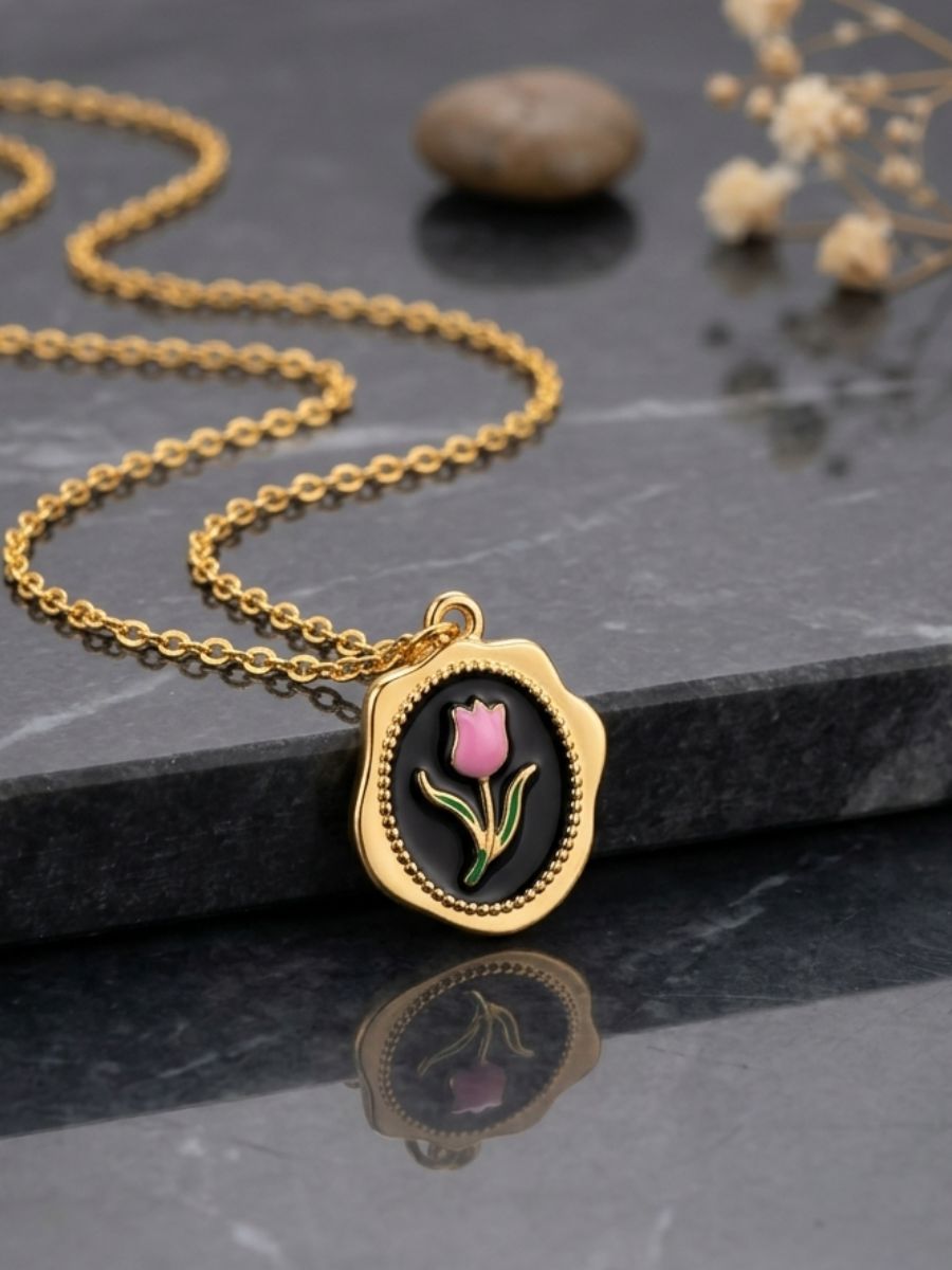 black-golden-flower-pendant-main Vintage Pink Tulip Black Enamel Pendant - Image 1