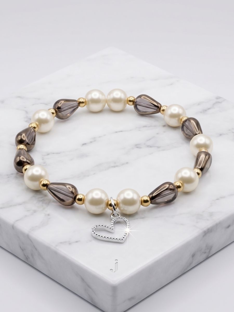 brown-and-white-pearl-bracelet Smoky Pearl Heart Bracelet - Image 1