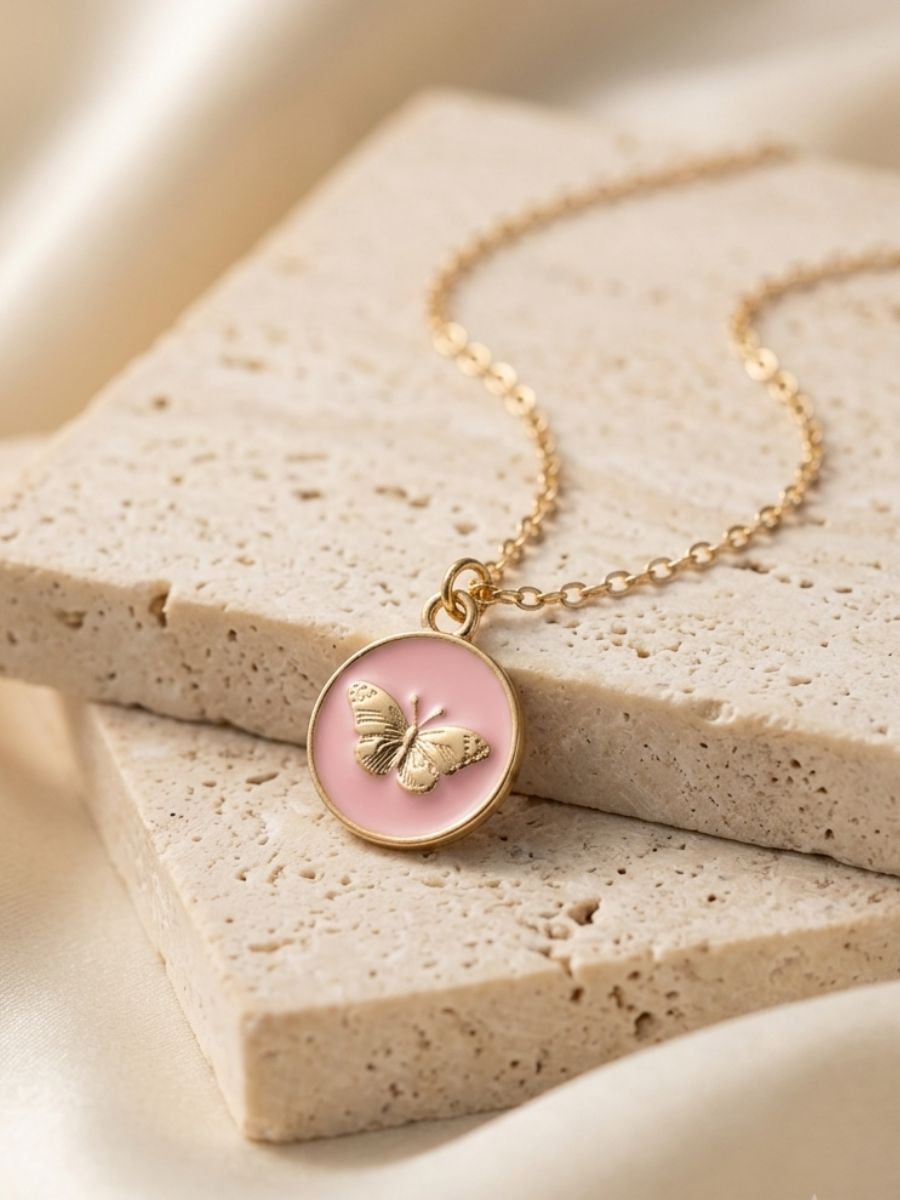 pink-butterfly-charm-pendant-main Golden Butterfly Blush Pink Enamel Medallion Necklace - Image 1