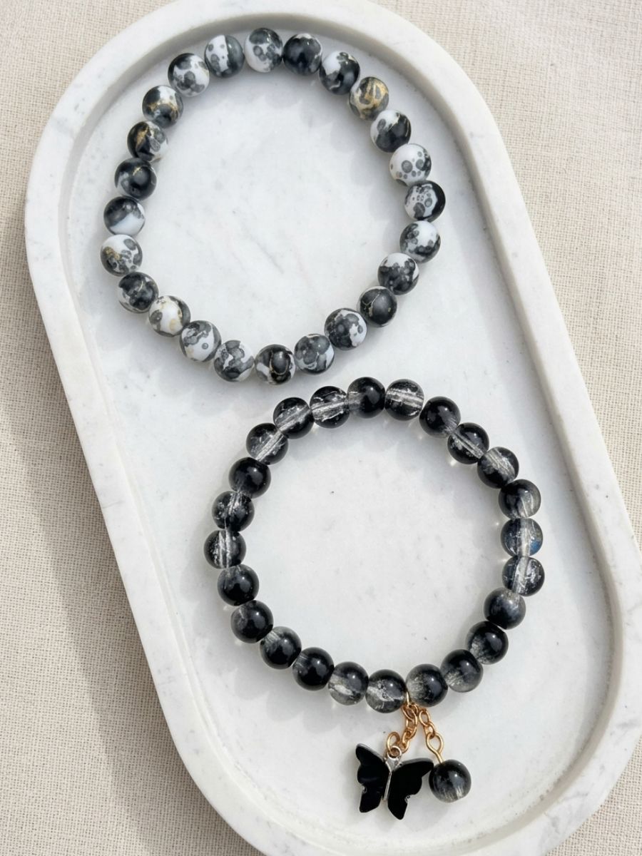 black-men-and-black-girl-stretchable-braclet-main Monochrome Marble and Black Butterfly Charm Couple Bracelet Set - Image 1