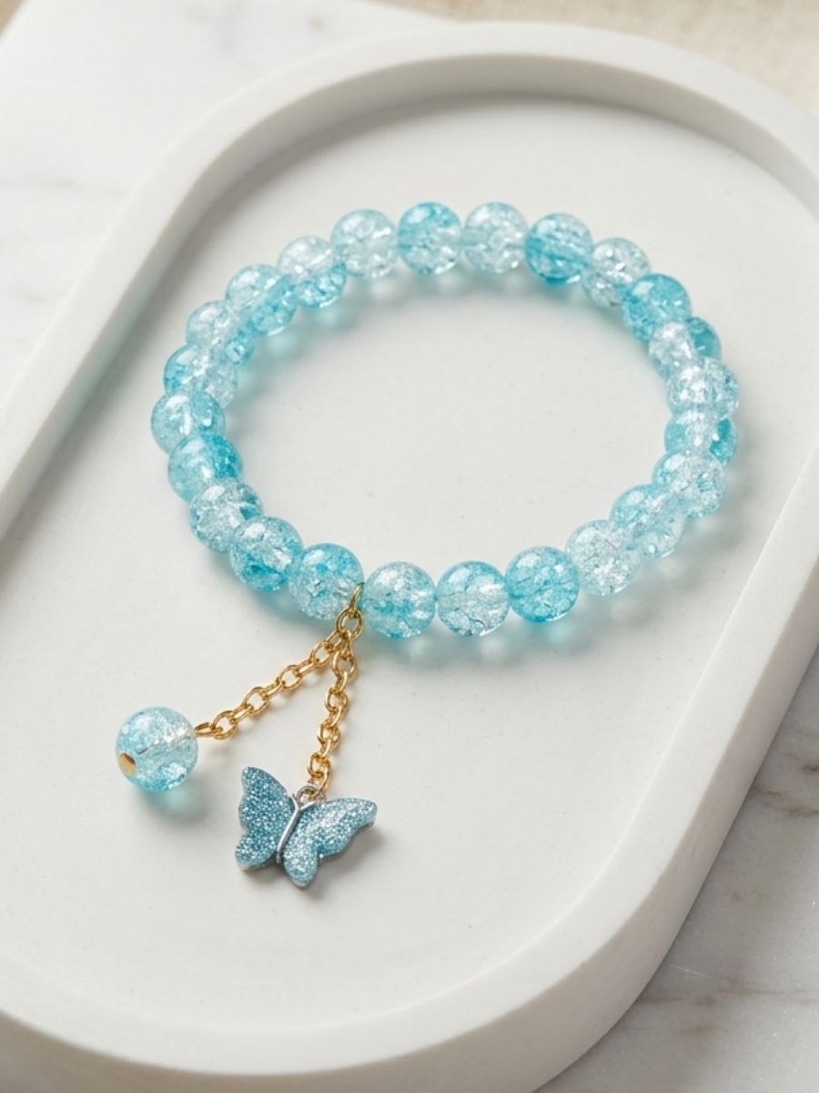 sky-blue-butterfly-charm-bracelet Sky Blue Butterfly Charm Bracelet - Image 1